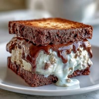 Vanilla Bean Frappuccino Ice Cream Sandwiches with creamy vanilla bean ice cream between espresso cookies.